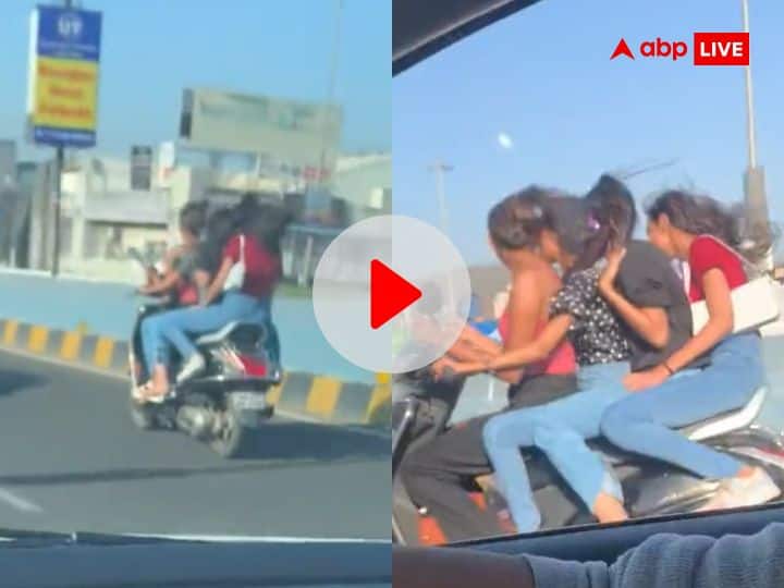 Mumbai Girls Scooty Video four girls going on a scooty video of taking selfie went viral Video: मुंबई की सड़क पर स्कूटी सवार चार लड़कियों ने ट्रैफिक नियमों की उड़ाई धज्जियां, सेल्फी लेती आईं नजर