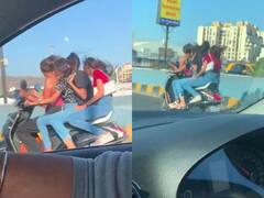 तेज स्पीड स्कूटी पर सवार दिखीं चार लड़कियां, सेल्फी लेने का ये वीडियो वायरल