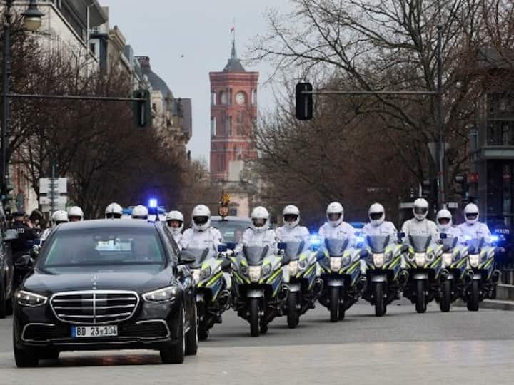 When they arrived at Berlin Brandenburg Airport on Wednesday afternoon local time to begin their three-day visit, they were greeted with a gun salute and a fly past by two military jets. When the King and Queen Consort stepped off the plane, they were greeted by German officials. (Image Source: AFP)