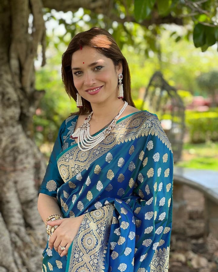 Ankita shared new pictures of herself in a blue silk saree with she complimented with white coloured jewellery