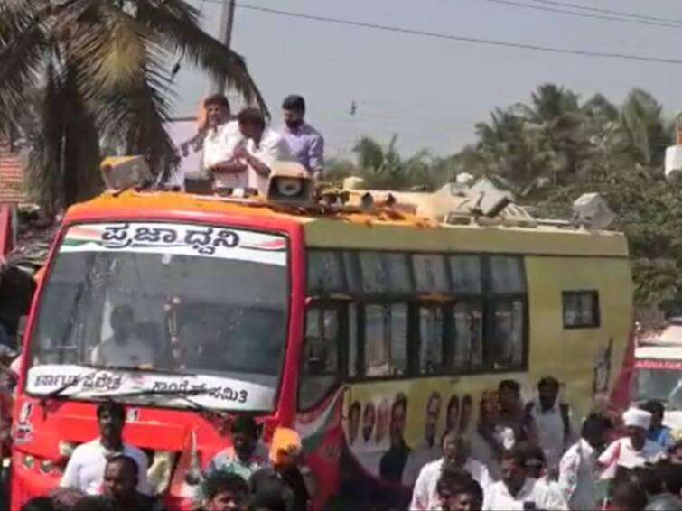 Watch: K'taka Congress Chief DK Shivakumar Throws Currency Notes During Rally In Mandya Watch: K'taka Congress Chief DK Shivakumar Throws Currency Notes During Rally In Mandya