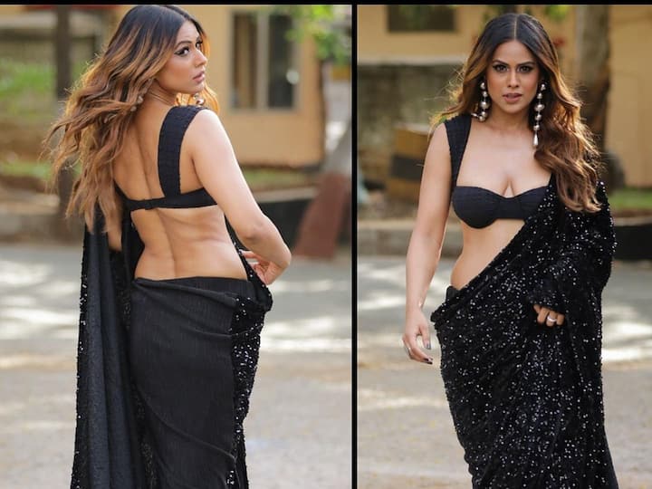 Nia Sharma recently dropped a series of pictures in a black saree and she looked stunning in it. Here are the pictures.