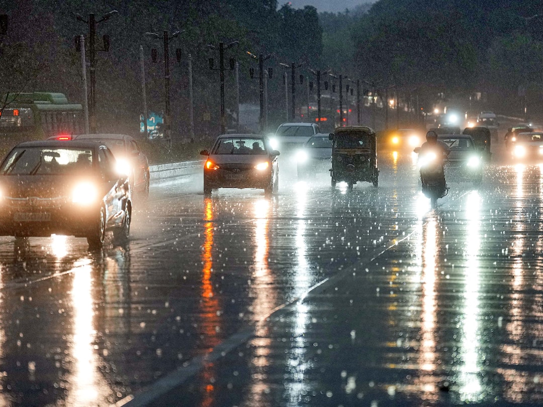 Delhi Waterlogging Roads After Thunderstorms Light Rain Waterlogging In Several Parts Of Delhi After Heavy Rain. Road Caves In Near Hauz Rani Red Light