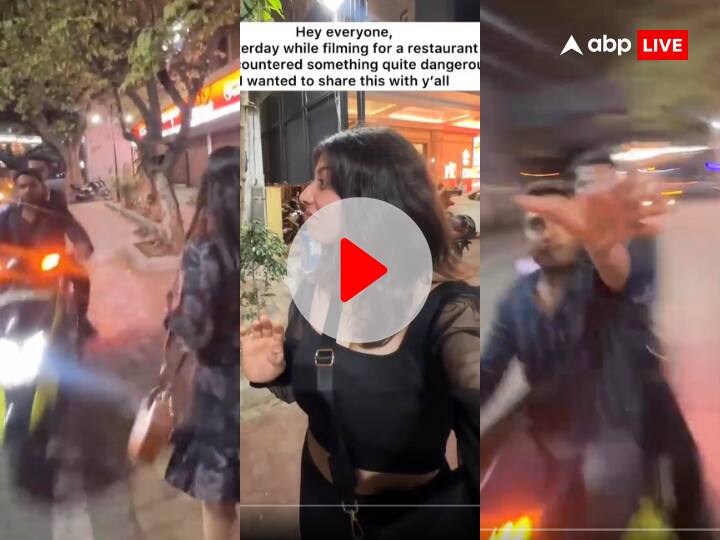 Bengaluru 2 bike borne man tries to snatch phone from content creator girls at Gufha Restaurant watch viral video Watch: बेंगलुरु की कंटेंट क्रिएटर ने रिकॉर्ड की LIVE फोन चोरी, वीडियो वायरल होने पर पुलिस ने लिया एक्शन