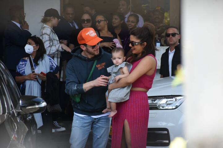 Priyanka and Nick posed with their daughter Malti for the paparazzi.