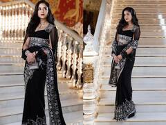 NMACC लॉन्च में Corset ब्लाउज के साथ ब्लैक साड़ी में नजर आईं Radhika Merchant, ग्लैम मेकअप लुक में देखें खास तस्वीरें