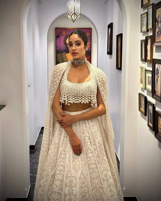 Janhvi Kapoor wore a pearl-studded lehenga which she accessorised with a neck choker piece