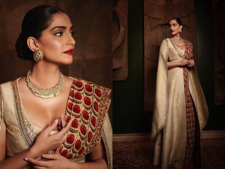 Sonam Kapoor wore a floor length beige coloured brocade anarkali ethnic set which she complimented with a red printed dupatta which she draped on the side. Check out pics