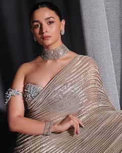 Alia Bhatt Exudes Elan In Silver And Gold At NMACC Event | SEE PICS