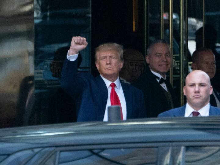 Former US president Donald Trump departs the Trump tower ahead of his arraignment at the Manhattan Criminal Court in New York City on April 4, 2023.