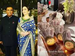 In Pics: अंबानी परिवार ने NMACC इवेंट में आए मेहमानों को 500 रुपये के नोट के साथ परोसा हलवा, वायरल हुई तस्वीरें