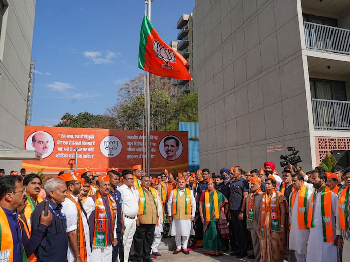 Bharatiya Janata Party (BJP) President JP Nadda with party leaders after hoisting the party flag on the occasion of BJP 'Sthapna Diwas' (Foundation Day) at party headquarters in New Delhi on Thursday. (Source: PTI)