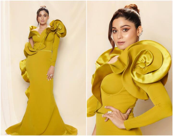 Shamita Shetty is mesmerising fans with her latest set of pictures on Instagram. The diva can be seen going all glam in a golden yellow gown.