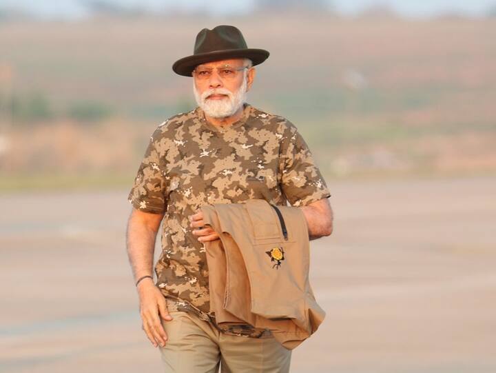 The Prime Minister's Office (PMO) shared a photo of him in a speckled safari clothing and hat, earlier today.