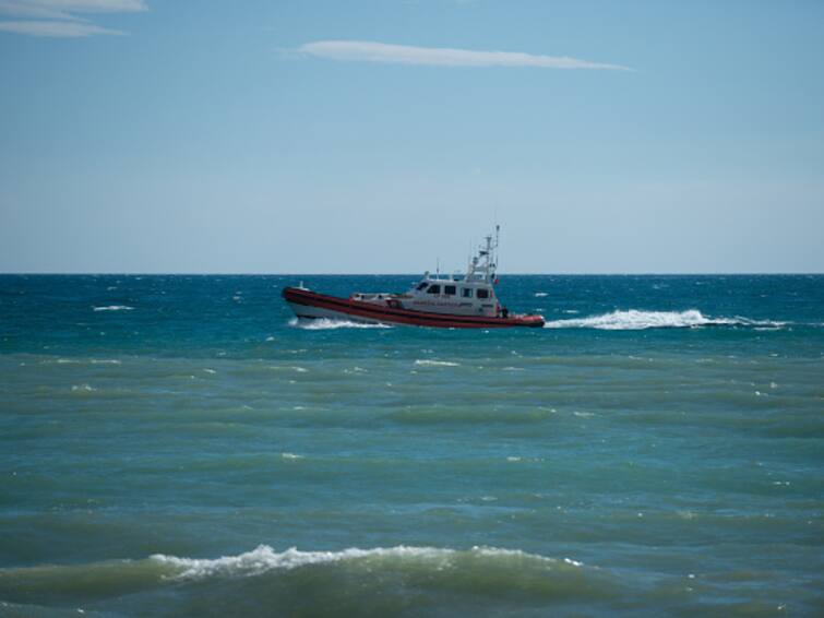 Italy's Coastguard Works To Rescue Two Fishing Boats Carrying 1,200 Migrants Drifting At Sea Italy's Coastguard Works To Rescue Two Fishing Boats Carrying 1,200 Migrants Drifting At Sea