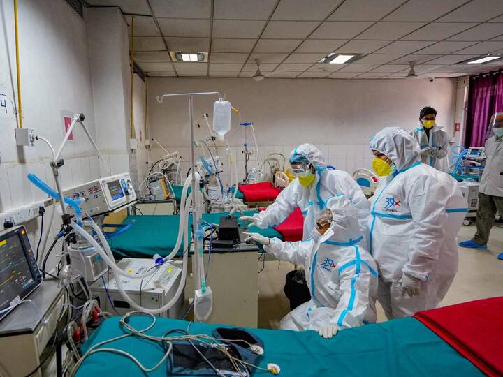 Healthcare workers participate in a mock drill to check Covid preparedness at Balrampur Hospital in Lucknow on April 11. (Image: PTI)