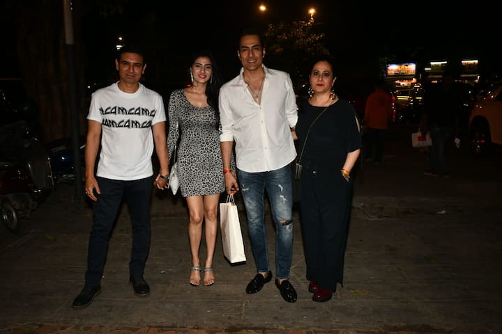 Rupali's 'Anupamaa' co-star Sudhanshu Pandey with his wife. TV actor Sandeep Baswana was also present with his partner Ashlesha Sawant.