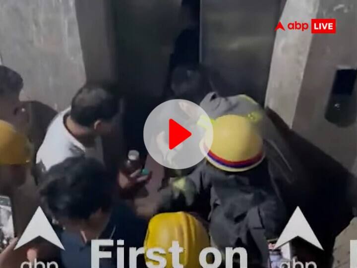Greater Noida Golf Gardenia Society Eight people pulled out by breaking lift Watch: ग्रेटर नोएडा के इस सोसाइटी में तोड़ी गई लिफ्ट, देर रात फंसे आठ लोगों का ऐसे हुई रेस्क्यू