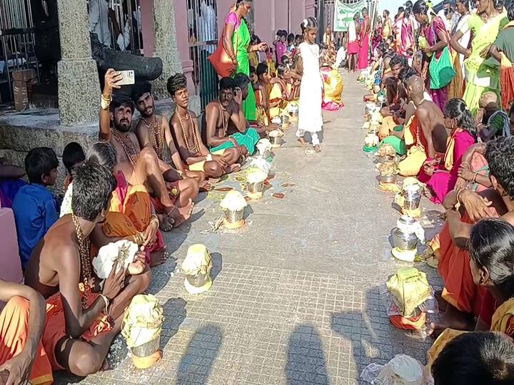 Devotees waiting in a long queue in Palani today for Tamil New Year TNN தமிழ் புத்தாண்டில் பழனியில் குவிந்த பக்தர்கள் -  நீண்ட வரிசையில் காத்திருந்து சாமி தரிசனம்