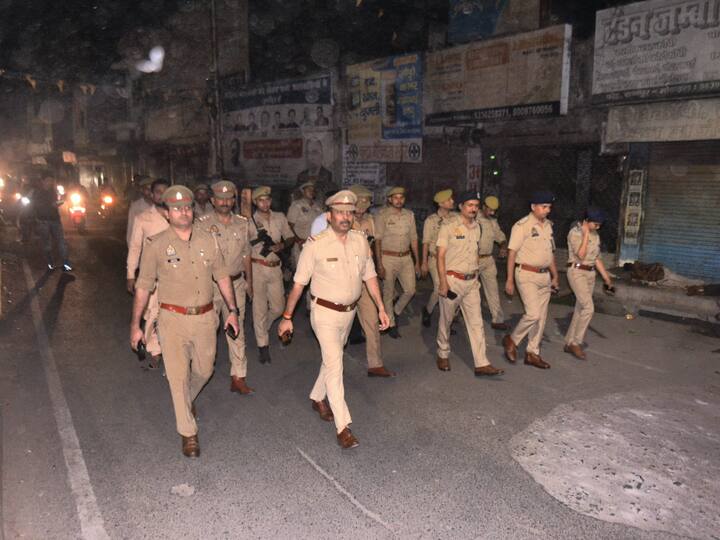 Police personnel patrol an area after the imposition of Section 144 in Uttar Pradesh in view of the killing of mafioso-turned-politician Atiq Ahmed and his brother Khalid Azim aka Ashraf by unidentified assailants in Prayagraj, in Kanpur, Sunday, April 16, 2023.