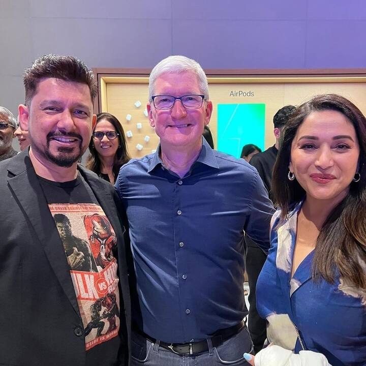 Madhuri Dixit Nene and her husband Sriram Nene were clicked as they stood with Tim. He also managed time to have Wada pav with her at an eatery that is the Ambani family's favourite. (Image Source: Instagram/FilmiFever)