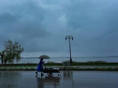Rains, Thunderstorm Lash Plain Areas Of J&K, Snowfall Seen In Higher Reaches. In Pics