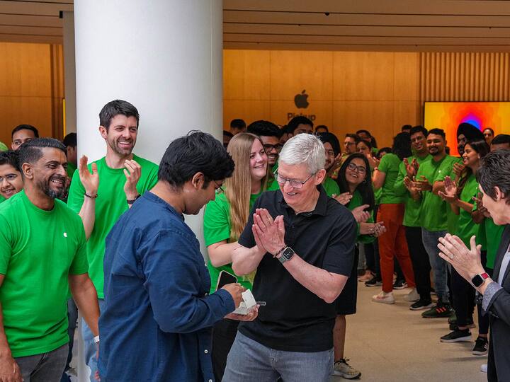 Apple CEO Tim Cook welcomes people at India's second Apple retail store, on the day of its opening, at Saket in New Delhi, Thursday, April 20, 2023.