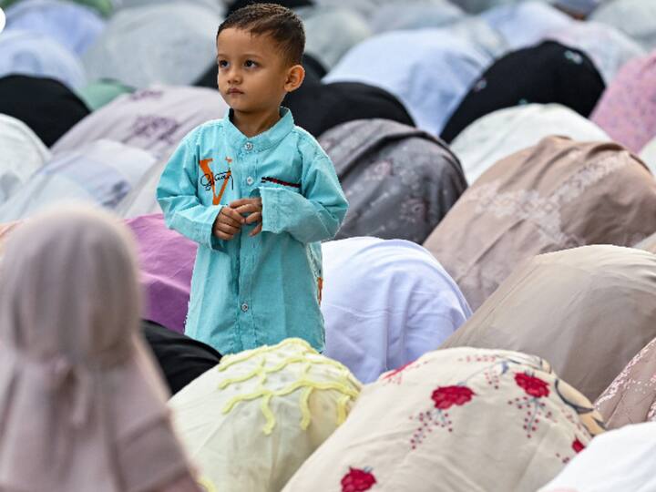 Devotees were seen bowing down during the prayers. The festival marks the end of the holy month of Ramadan, which is a period of fasting, prayer, and reflection. (Image Source: Twitter/@AFP)