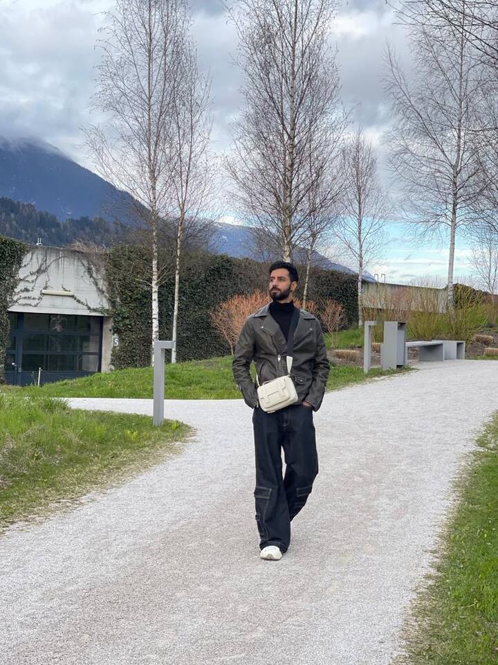 Here Bhuvan pulls off the white man-bag in style. The accessory game on point.