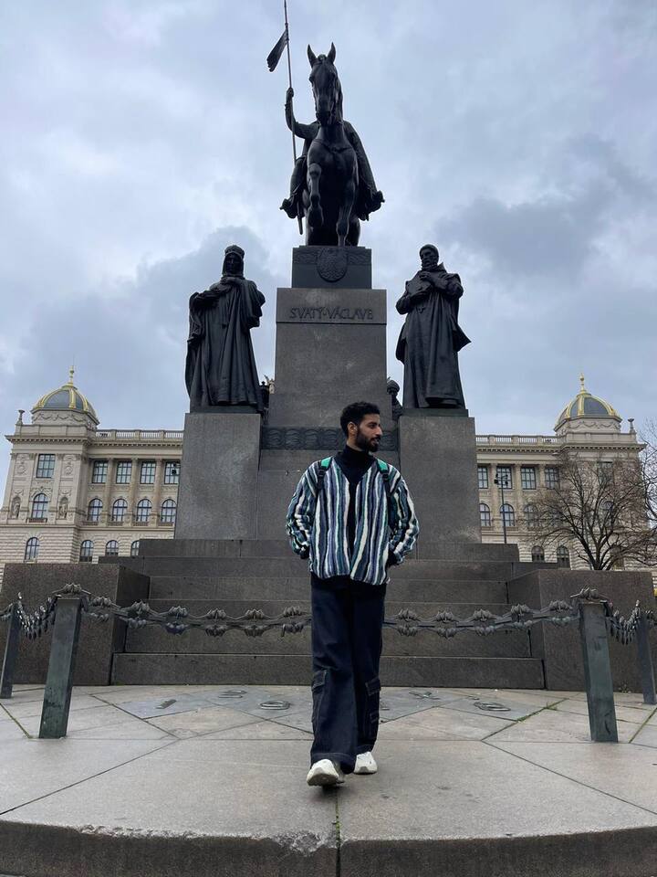 Serving a look that can never go wrong. A fleece striped jacket paired with wide leg denim cargos.