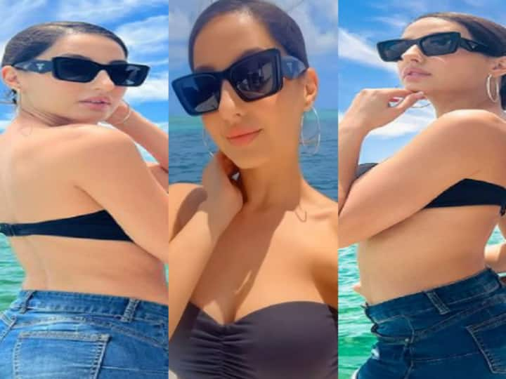 Nora Fatehi danced on a boat in black bikini video went viral on social media Watch Video: बीच पर बिकिनी पहन नोरा फतेही ने दिखाए किलर डांस मूव्स, इंटरनेट पर वायरल हुआ वीडियो