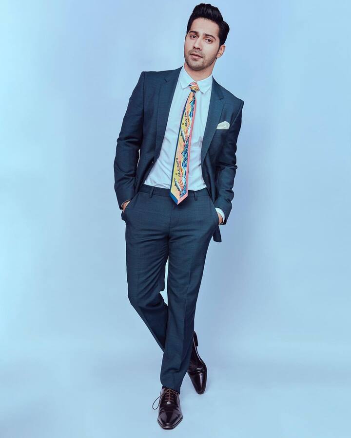Varun shows his refined taste as he wore a steel blue suit over a white shirt. The focus was on his dashing Paul Smith tie.