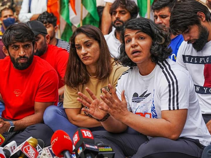 The country’s top wrestlers,  Bajrang Punia, Sakshi Malik, and Vinesh Phogat, are staging a sit-in protest at Jantar Mantar demanding an FIR against Wrestling Federation of India (WFI) president Brij Bhushan Sharan Singh. (Source: PTI)