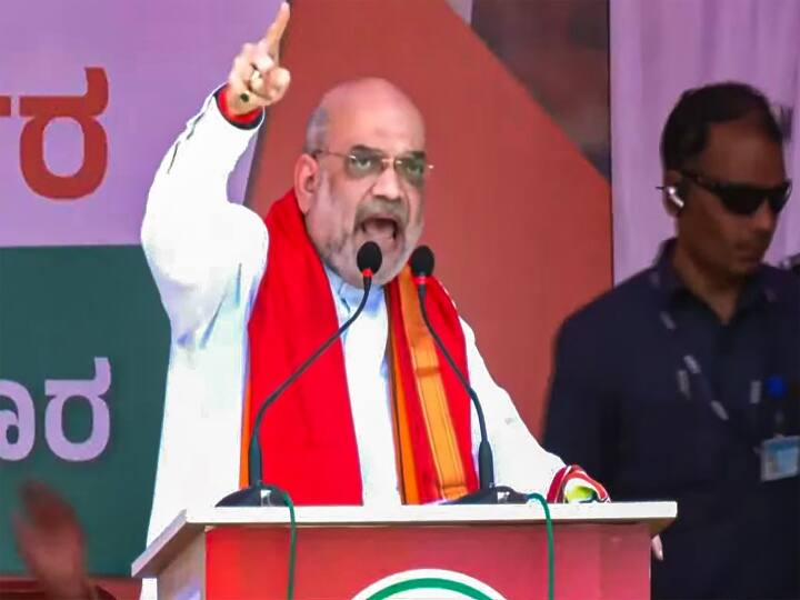 Karnataka Assembly Elections 2023 Amit Shah fiercely attacked Congress in Karnataka Karnataka Election 2023: 'गलती से भी कांग्रेस आई तो पूरा कर्नाटक दंगे से ग्रस्त हो जाएगा', विपक्ष पर अमित शाह का हमला