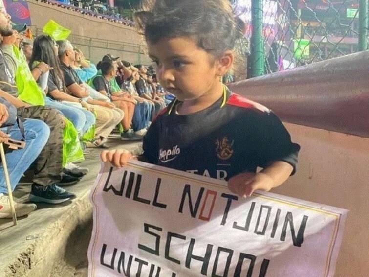 Photo Of Kid Holding Placard Reading 'No School Until RCB Wins IPL' Goes Viral Photo Of Kid Holding Placard Reading 'No School Until RCB Wins IPL' Goes Viral