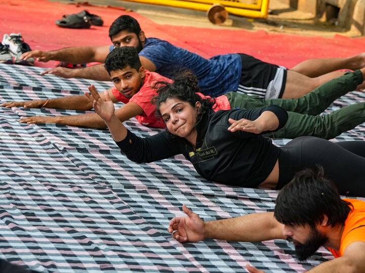 A physiotherapist was helping Bajrang on the mat at the same time, and then the Olympic bronze medalist stretched. They all seemed worn out, but despite their lack of sleep, their enthusiasm for sports was obvious. (Source: PTI)