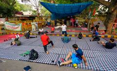 With Mosquito Nets And Dumbbells, Wrestlers' Keep On With Their Protest In Delhi. In Pics
