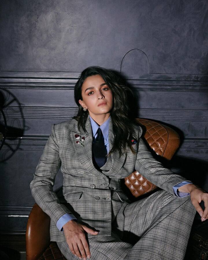 The shirt, pocket square and tie that she paired up with the pant suit are from the luxury line of Gucci.