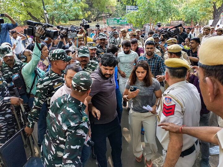 Wrestlers Bajrang Punia and Vinesh Phogat left the Connaught Place police station after receiving a copy of the two FIRs registered against WFI president Brij Bhushan Singh following allegations of sexual harassment by women wrestlers, reported news agency PTI. (Image Source: PTI)