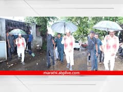 Photo : भर पावसात छत्री घेऊन कृषीमंत्री अब्दुल सत्तार नुकसानीच्या पाहणीसाठी बांधावर