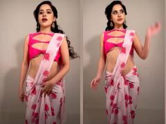 इस साड़ी से बनी है Uorfi Javed की नई अतरंगी ड्रेस! पीछे मुड़ीं तो देखा जूड़े में टांगा था पर्स, यूजर्स रोक नहीं पा रहे हंसी