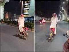 सीट के बजाए हैंडल पर बैठ बुजुर्ग शख्स ने चलाई साइकिल, खतरनाक स्टंट कर बिखेरा जलवा