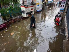 Light To Moderate Rain Bring Relief From Heat In Dehradun, Delhi-NCR & Patna. In Pics