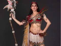 Jacqueline Fernandez Pics: જેકલિન ફર્નાન્ડિઝે ટ્રાયબલ લૂકમાં વર્તાવ્યો કેર, વધી ગઇ ફેન્સની ધડકનો, કહ્યું - 'ફાયર હૈ યે'