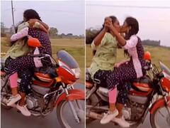 ਚੱਲਦੀ ਬਾਈਕ 'ਤੇ ਸਟੰਟ ਕਰਦੇ ਹੋਏ ਕੁੜੀਆਂ ਨੇ ਕੀਤੀ Kiss, ਸ਼ਾਇਦ ਹੀ ਦੇਖਿਆ ਹੋਵੇਗਾ ਅਜਿਹਾ Kissing ਸੀਨ! ਵੇਖੋ Viral Video