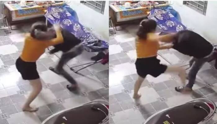 Wife beat husband for Coming late from office Viral Video ਘਰ 'ਚ ਵੜਦਿਆਂ ਹੀ ਪਤੀ ਦੀ ਹੋਣ ਲੱਗੀ ਕੁੱਟਮਾਰ, ਲੱਤਾਂ-ਮੁੱਕੇ ਮਾਰਨ ਦੀ ਪਤਨੀ ਦੀ ਵੀਡੀਓ ਹੋਈ ਵਾਇਰਲ