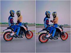 हेलमेट पहन कपल ने बाइक पर रोमांस के साथ किया हैरतअंगेज स्टंट, वीडियो देख खुली रह गई आंखें