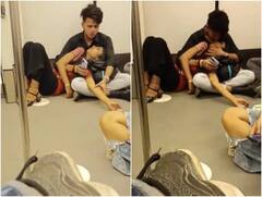 मेट्रो का एक और वीडियो वायरल... इस बार फर्श पर लेटकर Kiss करता नजर आया कपल! देखें वीडियो