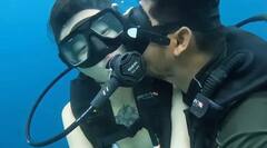 Kissing Women Underwater: நீச்சல் அடிக்க சென்ற பெண்ணை நீருக்கடியில் முத்தமிட்ட டைவிங் பயிற்சியாளர்! நடந்தது என்ன?