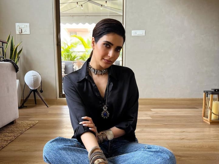 Karishma Tanna shared new pictures of herself of Instagram. While many liked her picture, a fan compared her to Deepika Padukone, calling her 'junior Deepika Padukone'. See